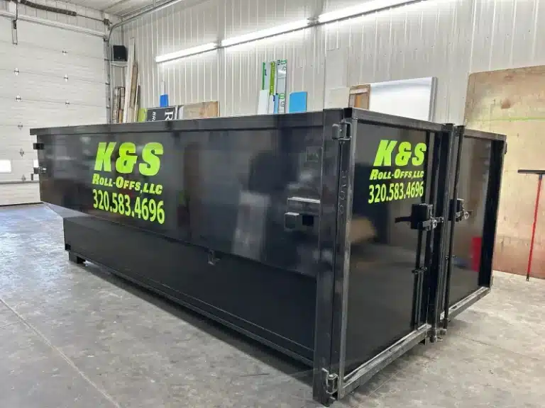 roll-off dumpster inside the k&s warehouse